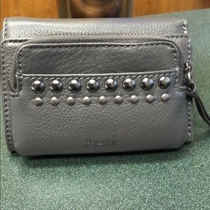 The Sak - small grey, leather wallet.